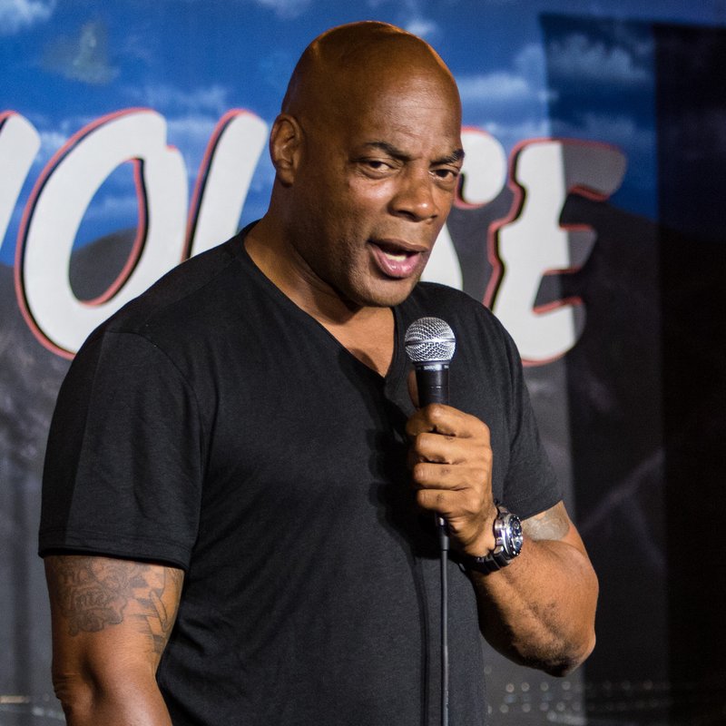 Alonzo Bodden on stage at a Cool Beans Comedy show.
