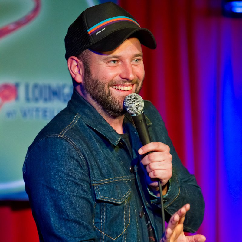 Brent Morin on stage at a Cool Beans Comedy show.