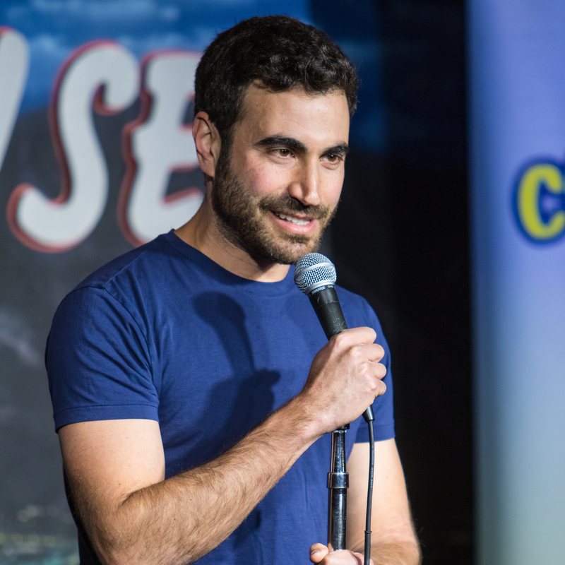 Brett Goldstein on stage at a Cool Beans Comedy show.
