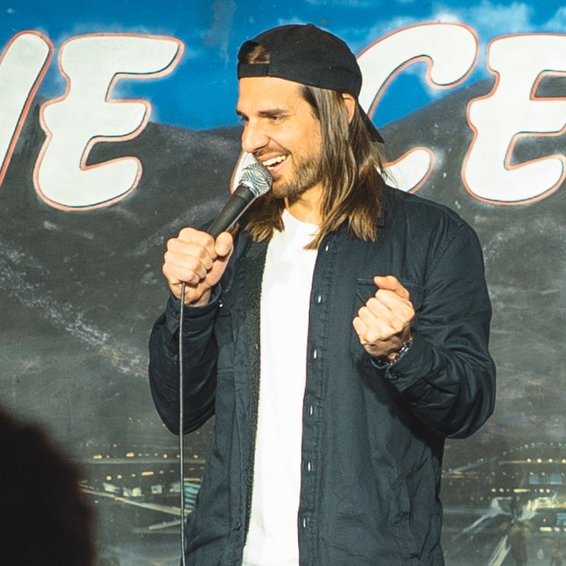 Craig Conant on stage at a Cool Beans Comedy show.