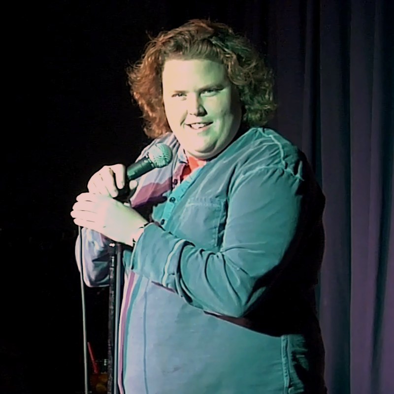 Fortune Feimster on stage at a Cool Beans Comedy show.