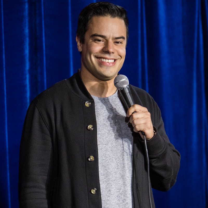 Francisco Ramos on stage at a Cool Beans Comedy show.