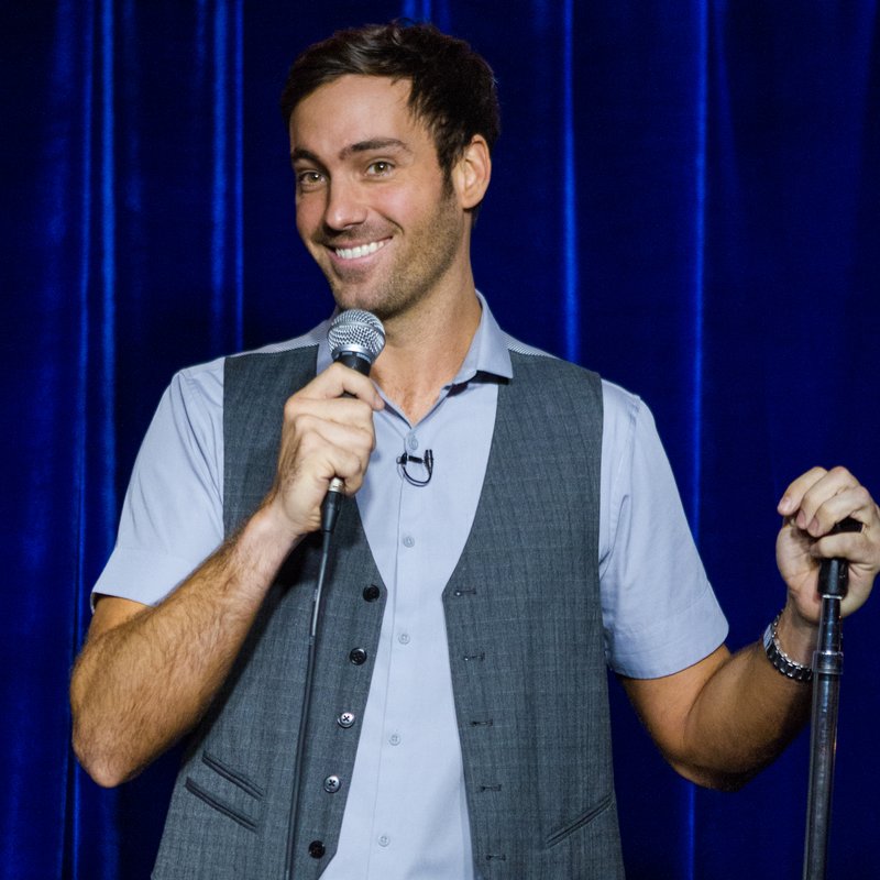 Jeff Dye on stage at a Cool Beans Comedy show.
