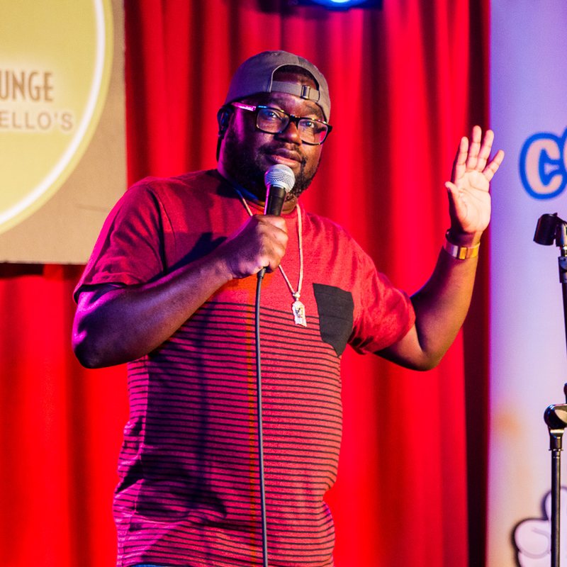 Lil Rel Howery on stage at a Cool Beans Comedy show.