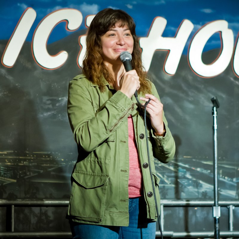 Melissa Villaseñor on stage at a Cool Beans Comedy show.