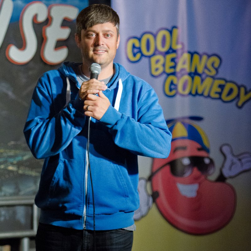 Nate Bargatze on stage at a Cool Beans Comedy show.