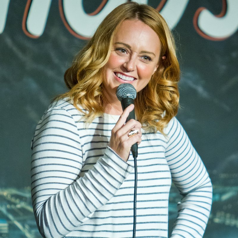 Sarah Tiana on stage at a Cool Beans Comedy show.