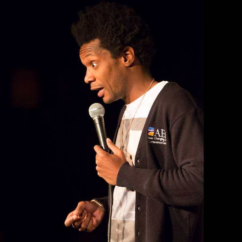Seaton Smith on stage at a Cool Beans Comedy show.