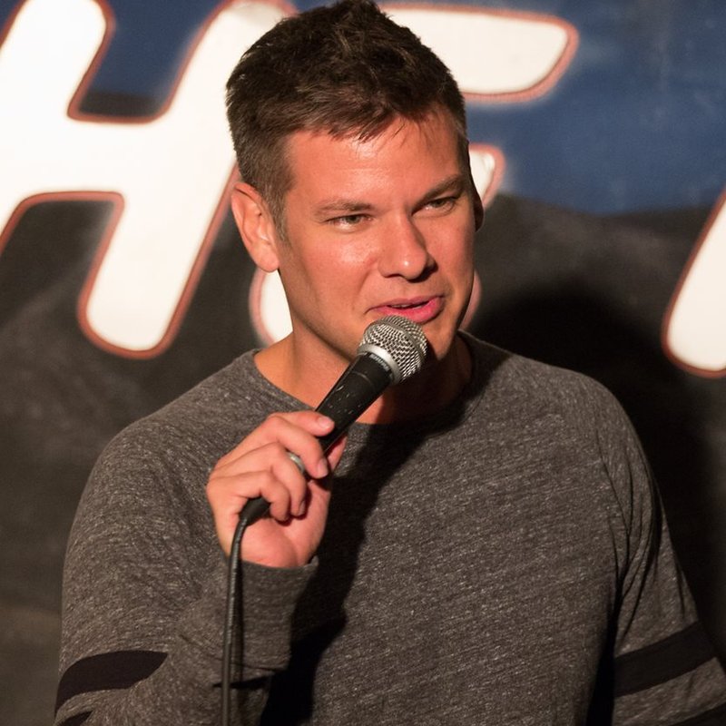 Theo Von on stage at a Cool Beans Comedy show.