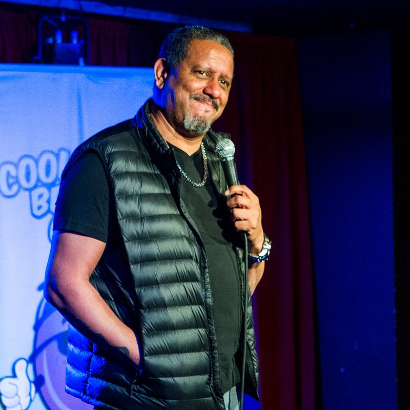 Todd Rexx on stage at a Cool Beans Comedy show.