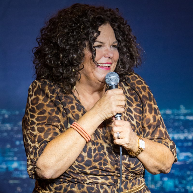 Vicki Barbolak on stage at a Cool Beans Comedy show.