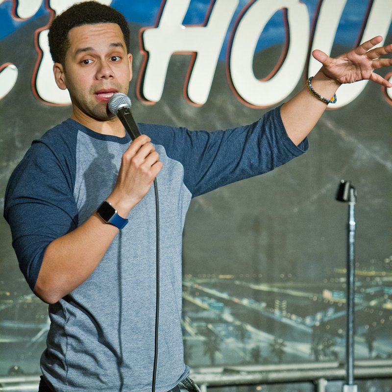 Vladimir Caamano on stage at a Cool Beans Comedy show.